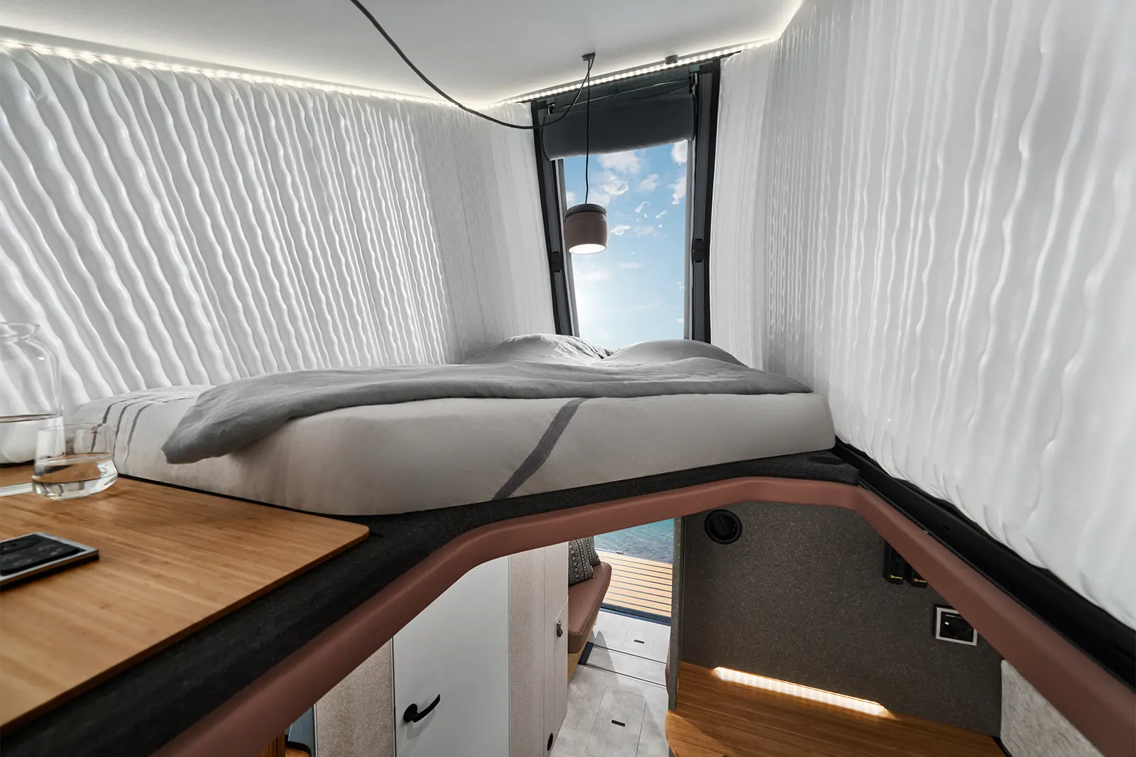The view through the Instant Loft of the HYMER Venture S during the day.